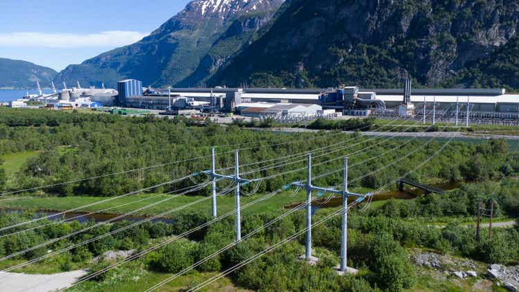 Aerial view of Hydro Norse aluminum production facility with a large power line leading to the industrial park