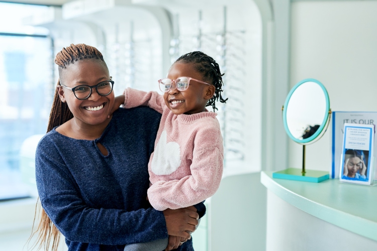 Glasses, mother and child portrait, happy for eyecare and eyes wellness or vision. Black woman, kid and happiness or smile for eyeglasses, sight healthcare and lens frame in optometrist office
