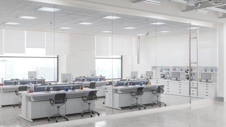 Outside View Of Empty Science Laboratory With White Desks, Microscopes And Other Scientific Equipments