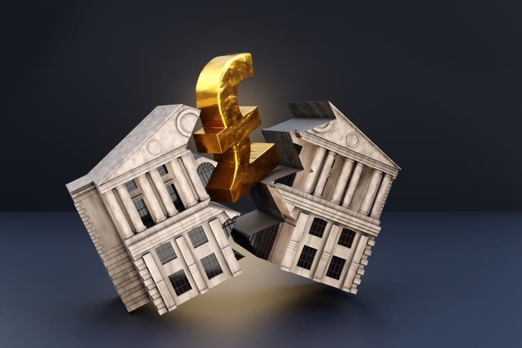 Golden British pound sign breaks an ancient bank building into halves. Illustration of the concept of the impact and crisis of falling price of UK sterling