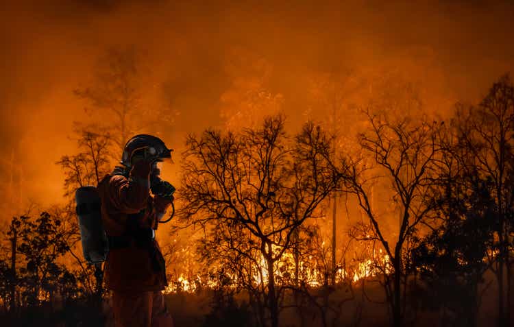 Firefighters are battling wildfires as climate change and global warming drive global wildfire trends.