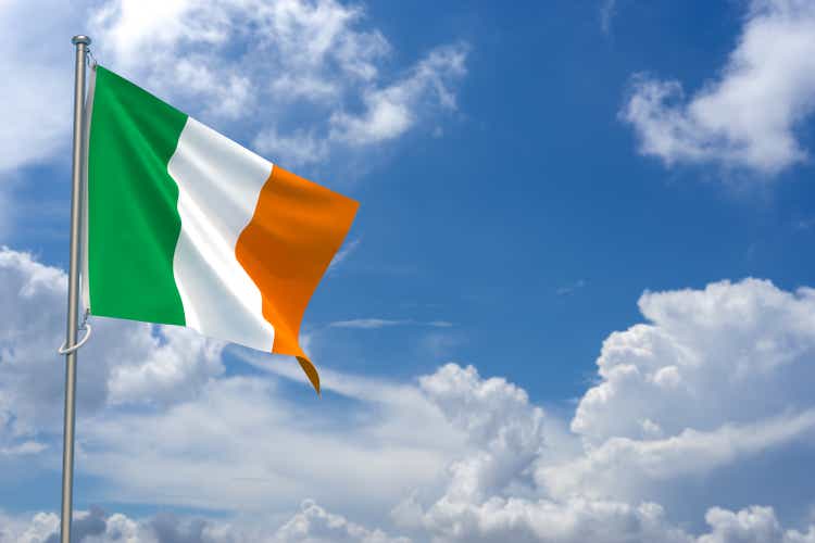 Republic of Ireland Flags Over Blue Sky Background. 3D Illustration