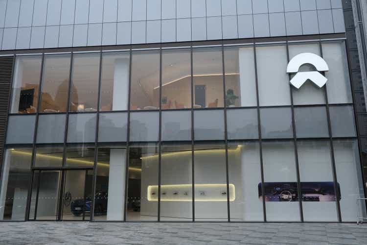 large Nio electric car retail store with brand logo