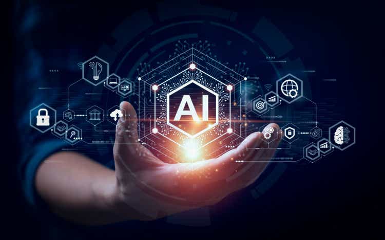Businessman touching the brain working of Artificial Intelligence (<a href='https://seekingalpha.com/symbol/AI' title='C3.ai, Inc.'>AI</a>) Automation, Predictive analytics, Customer service AI-powered chatbot, analyze customer data, business and technology