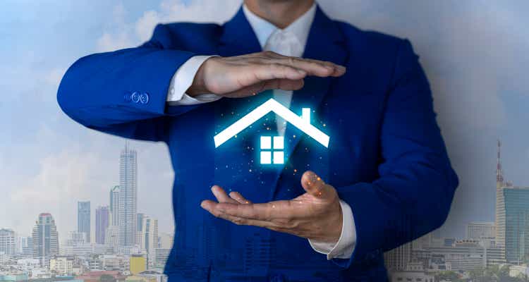 real estate agent to protect the house for customers, homebuyers, insurance, ready give to with new owner. Home insurance sales concept.