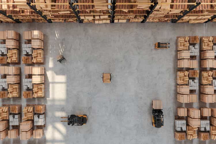 High Angle View Of Warehouse With Forklift, Pallet, AGV And Cardboard Boxes