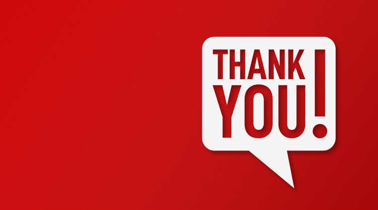 Thank You and Speech Bubbles with Copy Space On Red Cardboard Background