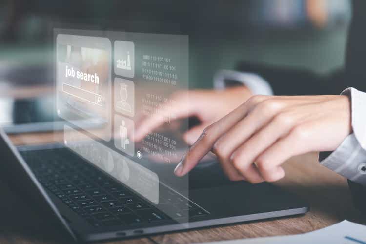 Man using laptop showing online job search, career search ideas, recruitment, HR search, form websites and job applications,employment management of agencies with Internet technology