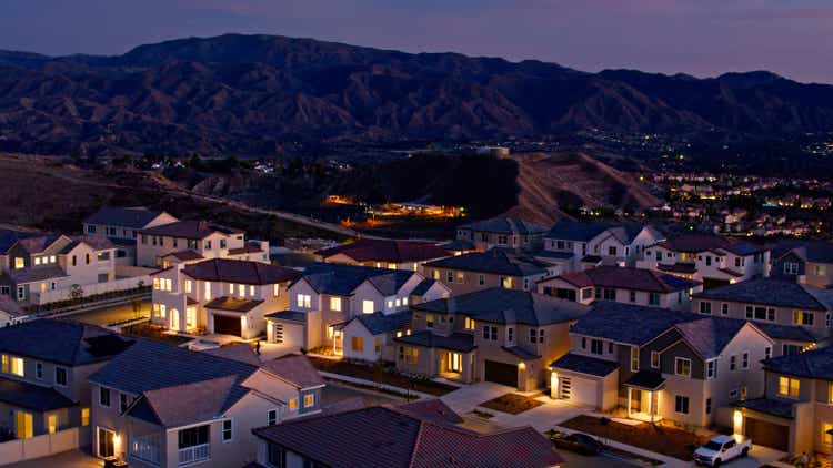 Rithm Capital and Sculptor: Breaking Away from the Norm 1 Aerial View of Illuminated Homes in Santa Clarita