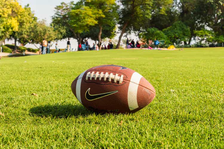 Rugby ball on a patch of grass. a national sport in the United States of America.