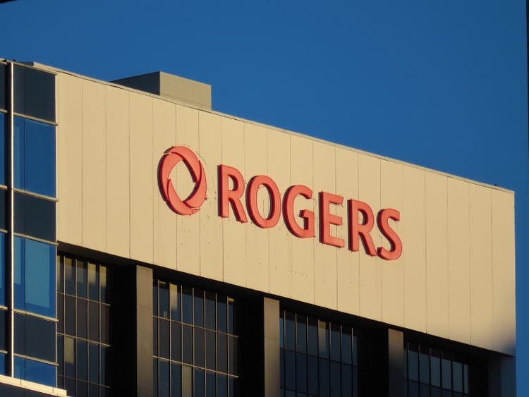 A Rogers signage at the top of a building.