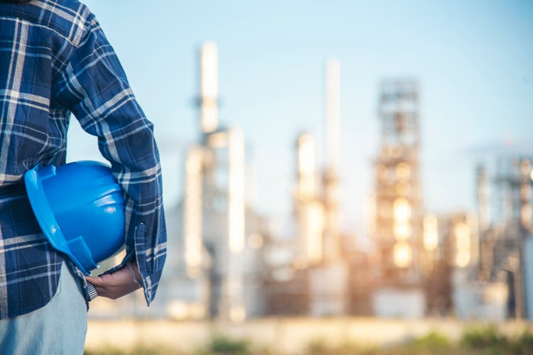 Electrician Technical operator worker hardhat blue work helmet Engineering. engineer woman hand holding Blue hard hat. Electrician woman worker oil petro industry safety at work blue worker helmet.