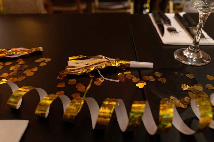 Golden serpentine streamers for party