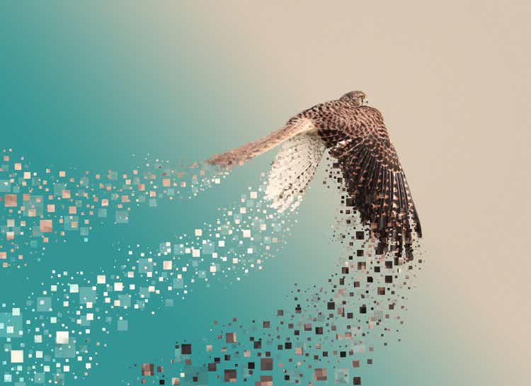 Flying falcon leaving pixels behind wings and tail on colorful background