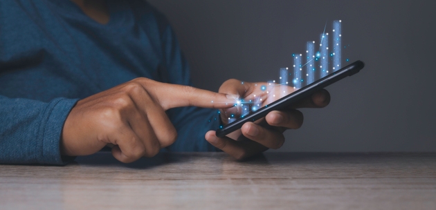 Stock market graph man with stock trading screen background.