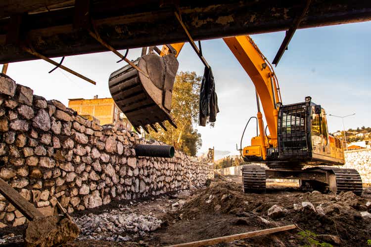 A digger working during the daytime.