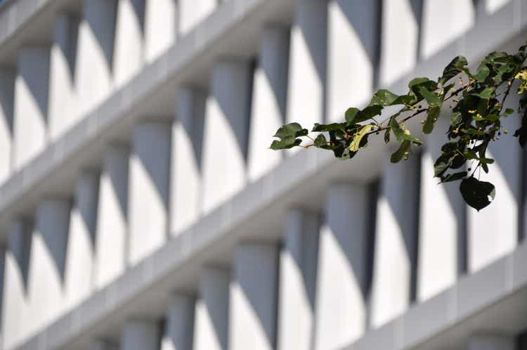 modern white building exterior symetric windows in a row modern architecture