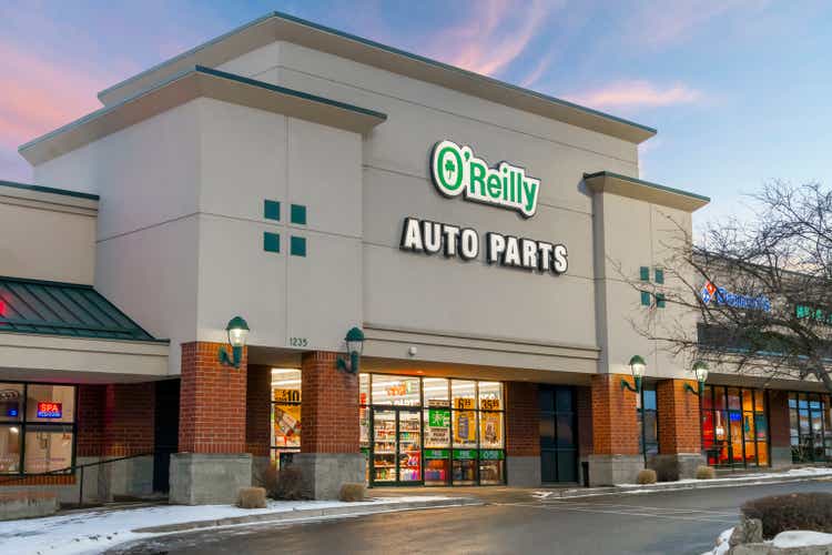 An O"Reilly Auto Parts store in a suburban strip mall in the evening in Spokane, Washington USA