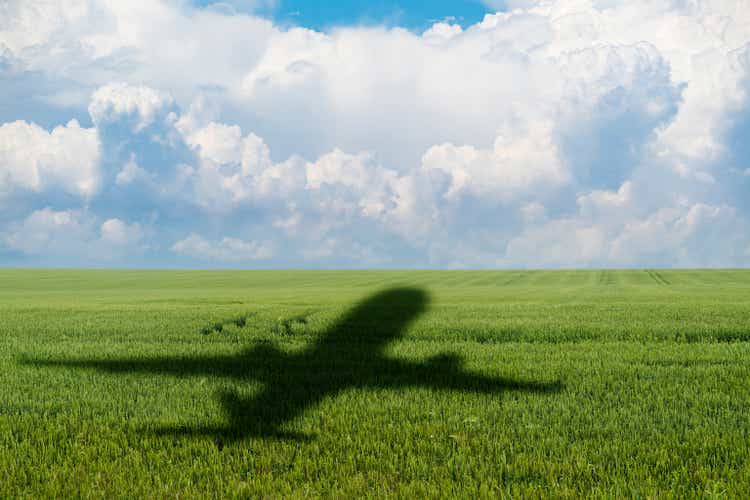 Shadow of the plane on the agricultural field.