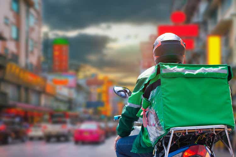 At Street Food in Chinatown, Thailand, delivery drivers are making deliveries to consumers who have placed online orders.