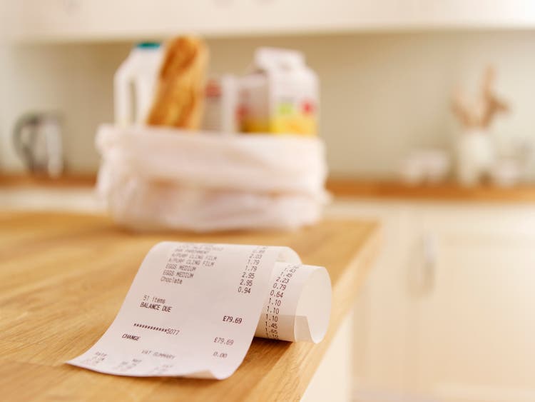 Close up of grocery receipt on kitchen counter