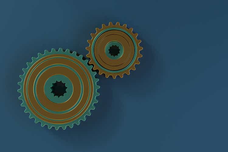 Mechanical Gear with Glossy Gold on a Blue Background