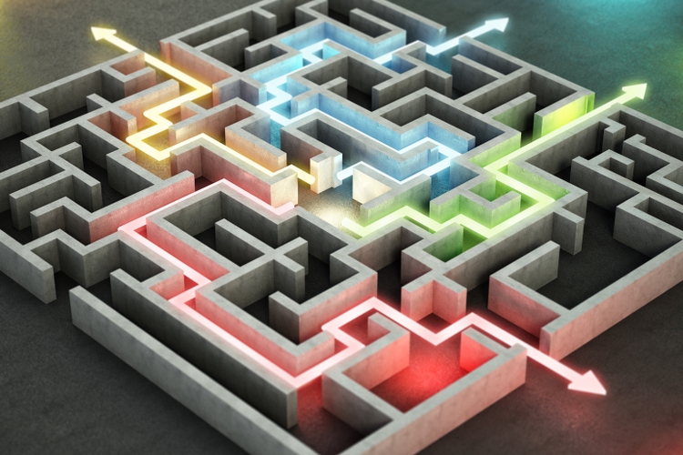 Four different colored glowing lines and arrows showing different ways out of the complex maze