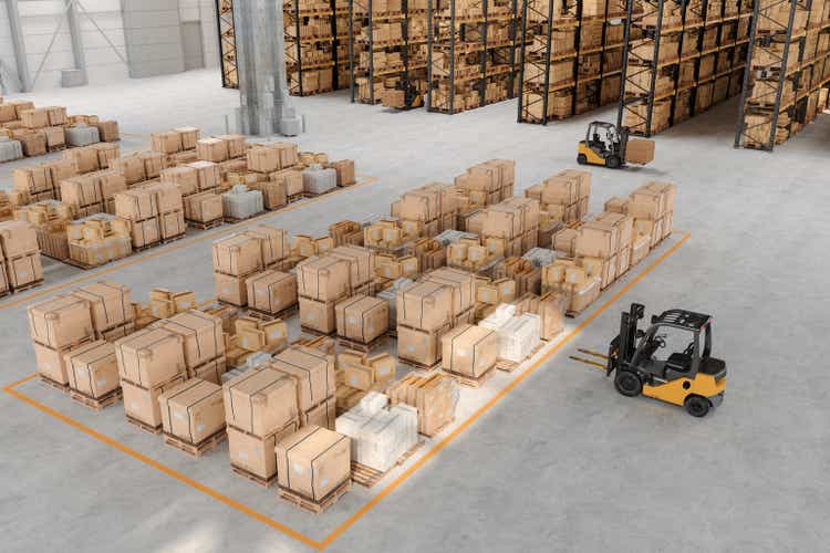 Digital image of High Angle View Of Warehouse With Forklifts And Cardboard Boxes