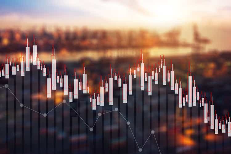 Abstract blurred double exposure of stock graph market exchange data board
