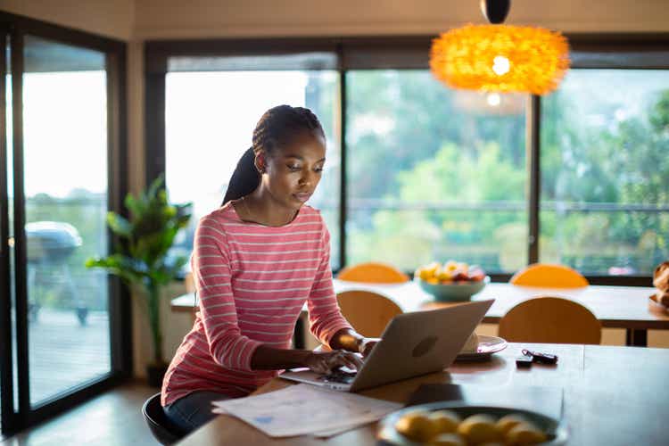 Young woman working from home