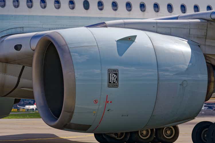 Close-up of Rolls-Royce engine of intercontinental airplane at Swiss airport.