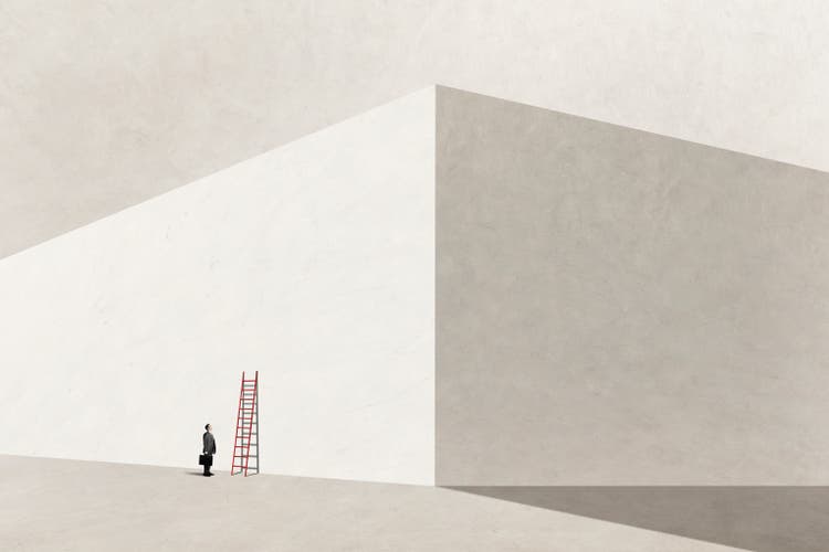 Man Climbing His Way To The Top