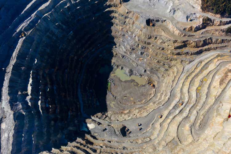 Flight over an open-pit copper mining operation in Rosia Poieni, Romania. Aerial view