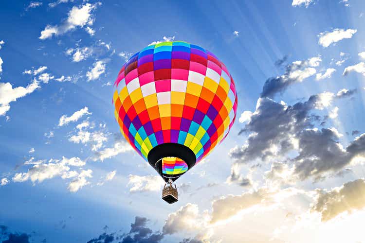 Hot air balloon flight over blue sky