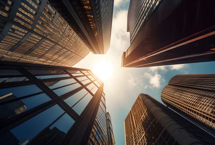 Looking up directly at the financial skyline