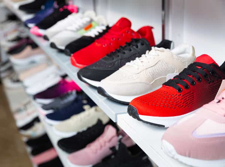 Counter with sports shoes in a store