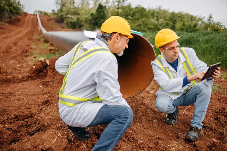 Engineers checking construction site