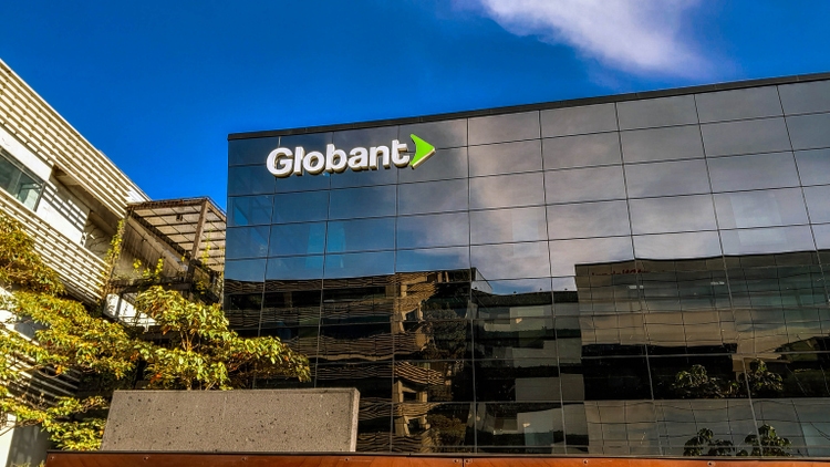 Globant glass building with blue sky in the background
