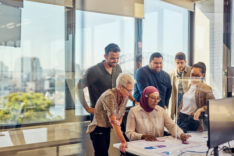 A multicultural team of professionals fostering collaboration and innovation in Sydney.