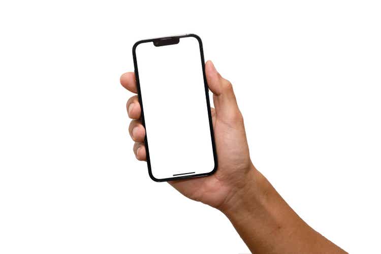 Hand holding smartphone isolated on white background - Clipping Path