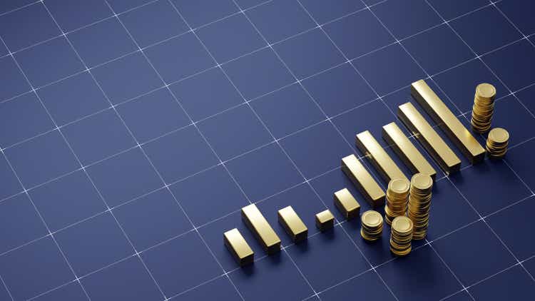 Golden finance table with stacks of gold coins on dark blue background with grid pattern