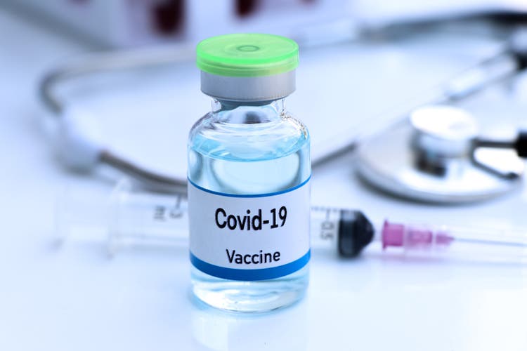 Covid-19 vaccine in vial, immunization and treatment of infection