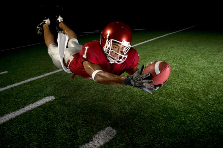 Wide Receiver Making a Diving Catch