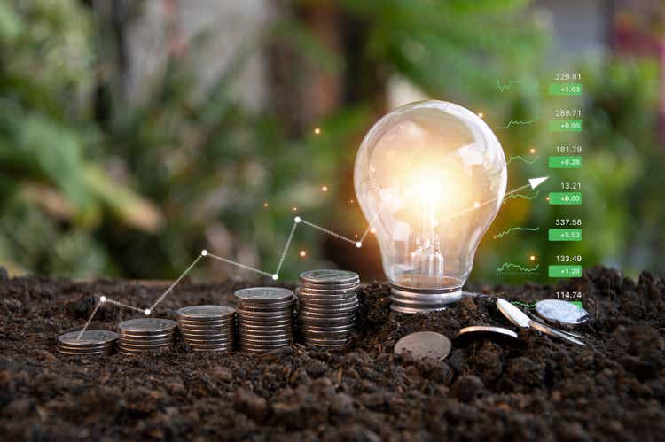 Business turnaround ideas, innovation, brainstorming, inspiration and problem solving ideas. Light bulbs and coins lay on the floor.