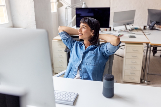 Businesswoman taking a break from work at her office