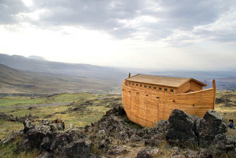 Noah"s Ark docked on rocks overlooking a landscape