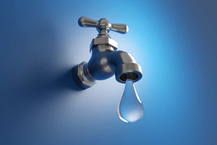 Classical silver water tap (faucet) dripping a large water droplet on blue background in minimalism. Illustration of the concept of saving water and pipe leakage