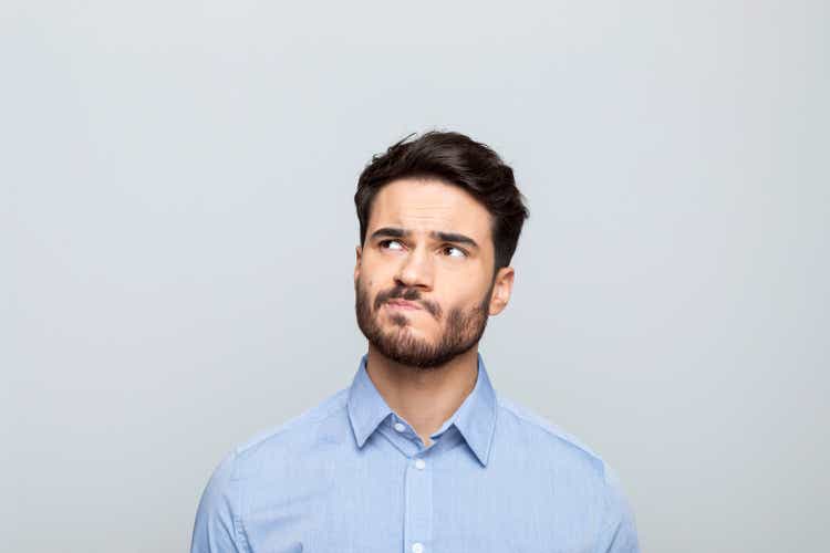 Headshot of worried businessman