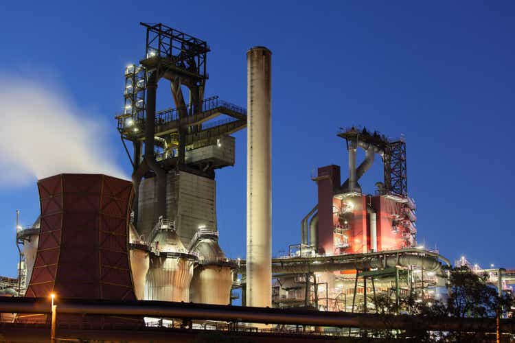 Modern blast furnaces at dusk