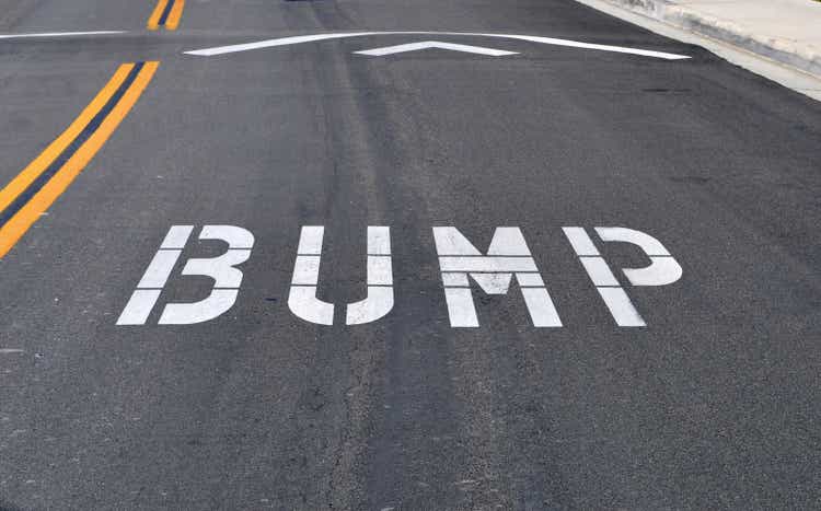 White bump road marking on black tarmac